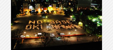 沖縄に基地はいらない キャンドルで人文字アクションを行いました